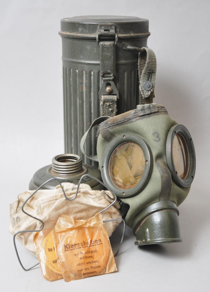 WW2 German Named Kriegsmarine M38 Communications Gas Mask With Kriegsmarine Marked Canister , Cleaning Cloth & Spring